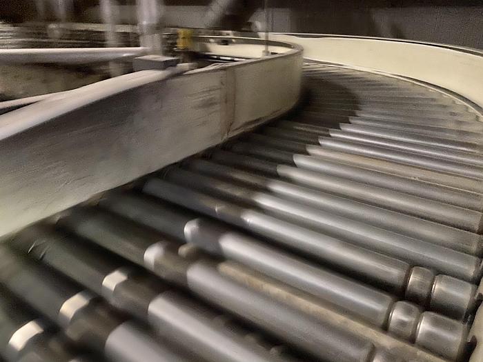 Used 1000’ OF ROLLER CONVEYOR WITH CURVING TRACK
