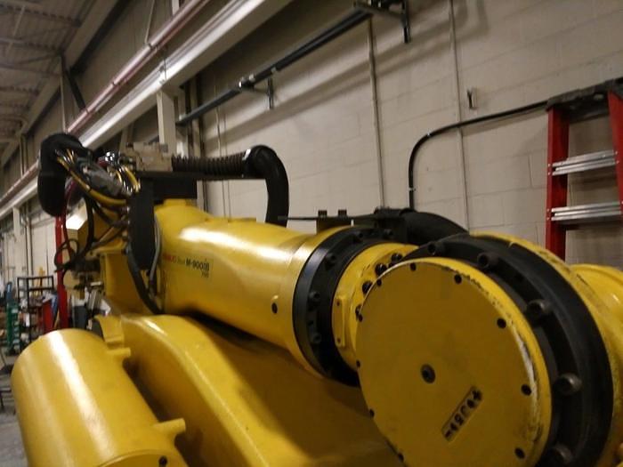 Used 2012 FANUC  M900iB/700 6 AXIS CNC ROBOT WITH R30iB CONTROLLER  & 7TH AXIS 15' LONG TRACK.