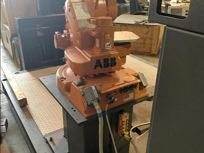 Used ABB IRB 1600-5/1.45 DUAL ARM ROBOTIC CELL WITH ABB TYPE MTC 750 POSITIONER AND IRC5 CONTROLLERS