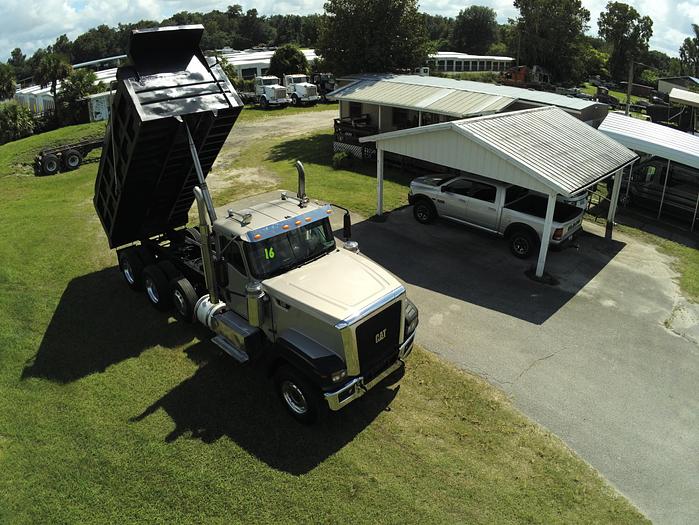 Used 2016 CATERPILLAR FACTORY DUMP TRUCK