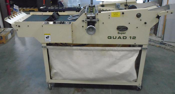 Used Therm-O-Type Super Quad 12, with Two Cassettes