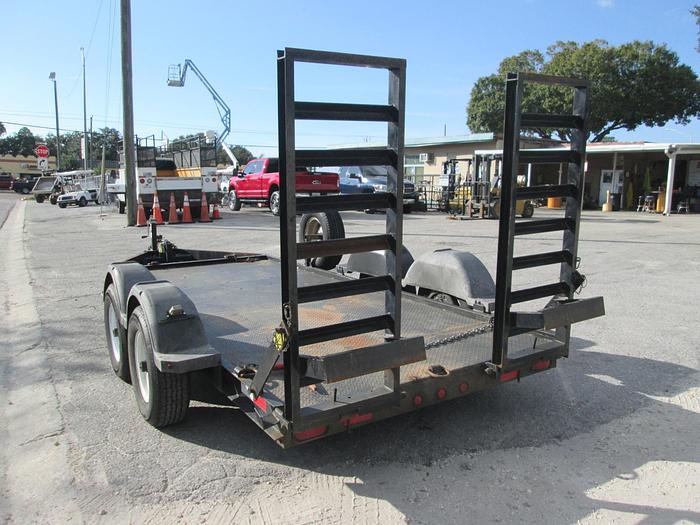 Used Low pro steel deck equipment trailer