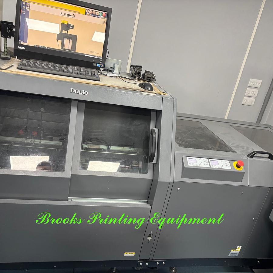 Used Duplo DBMi Saddle System with DSF-6000 Sheet Feeder & Cover Feeder, 2015