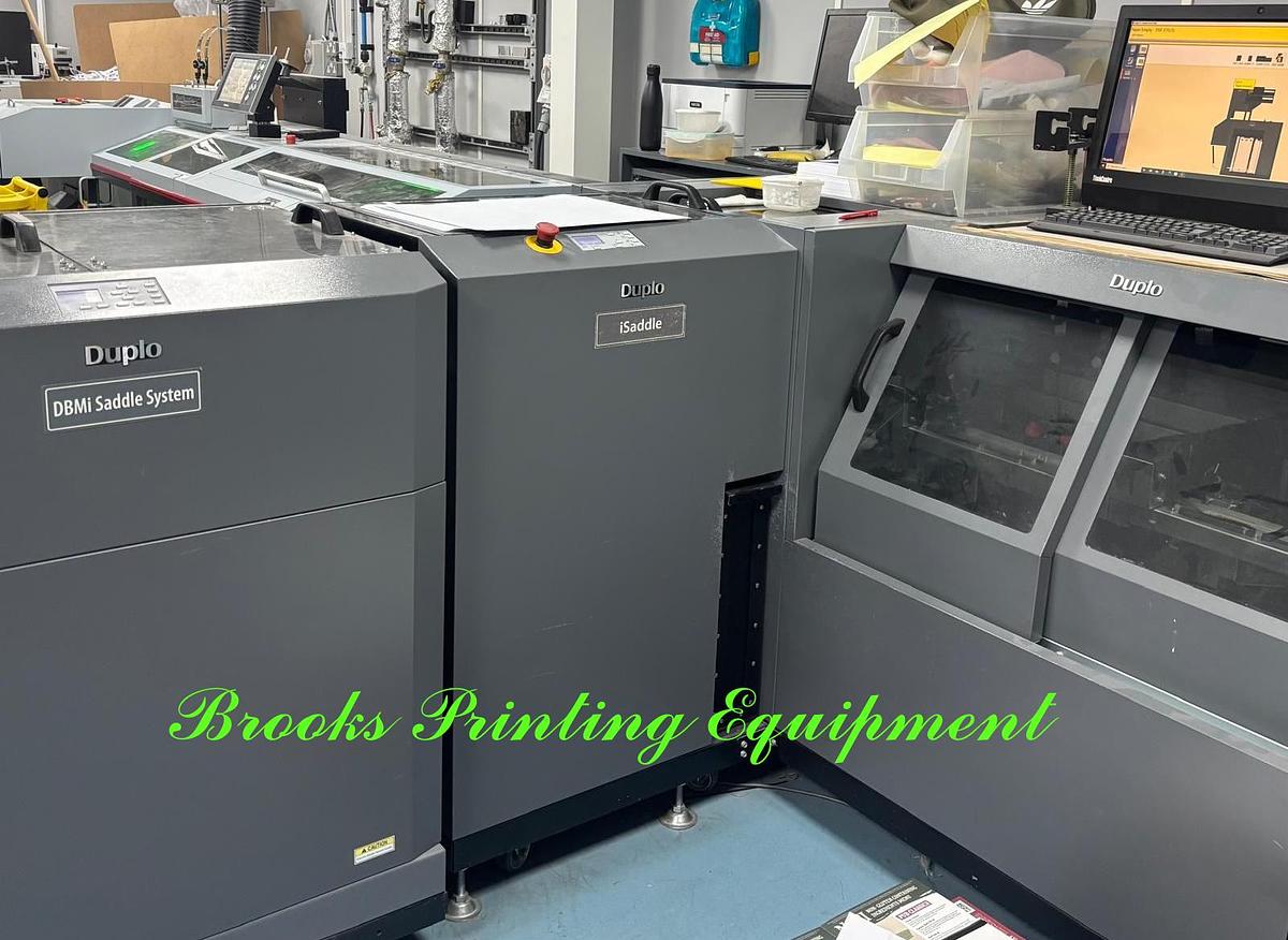 Used Duplo DBMi Saddle System with DSF-6000 Sheet Feeder & Cover Feeder, 2015