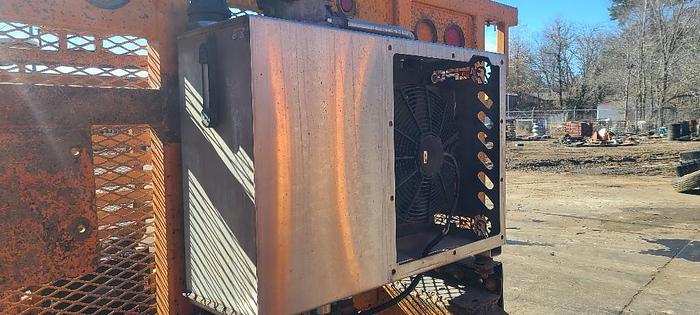 Used USED HEADACHE RACK WITH HYDRAULIC COOLER FOR VACUUM PUMP SYSTEM.