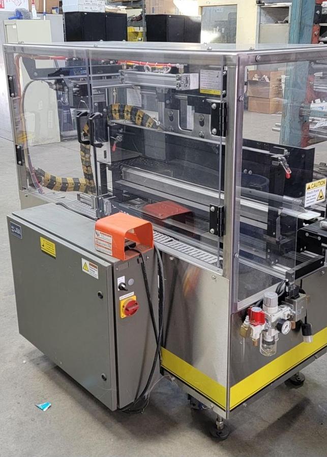 Used USED ECONOSEAL ECONOPACKER