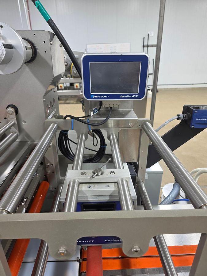 Used Campbell Revolution  Flow Wrapper with Automation