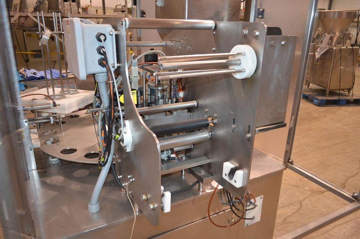 Used PacTec Model PTR6X2S Double Head Rotary Cup Filler with Sealer