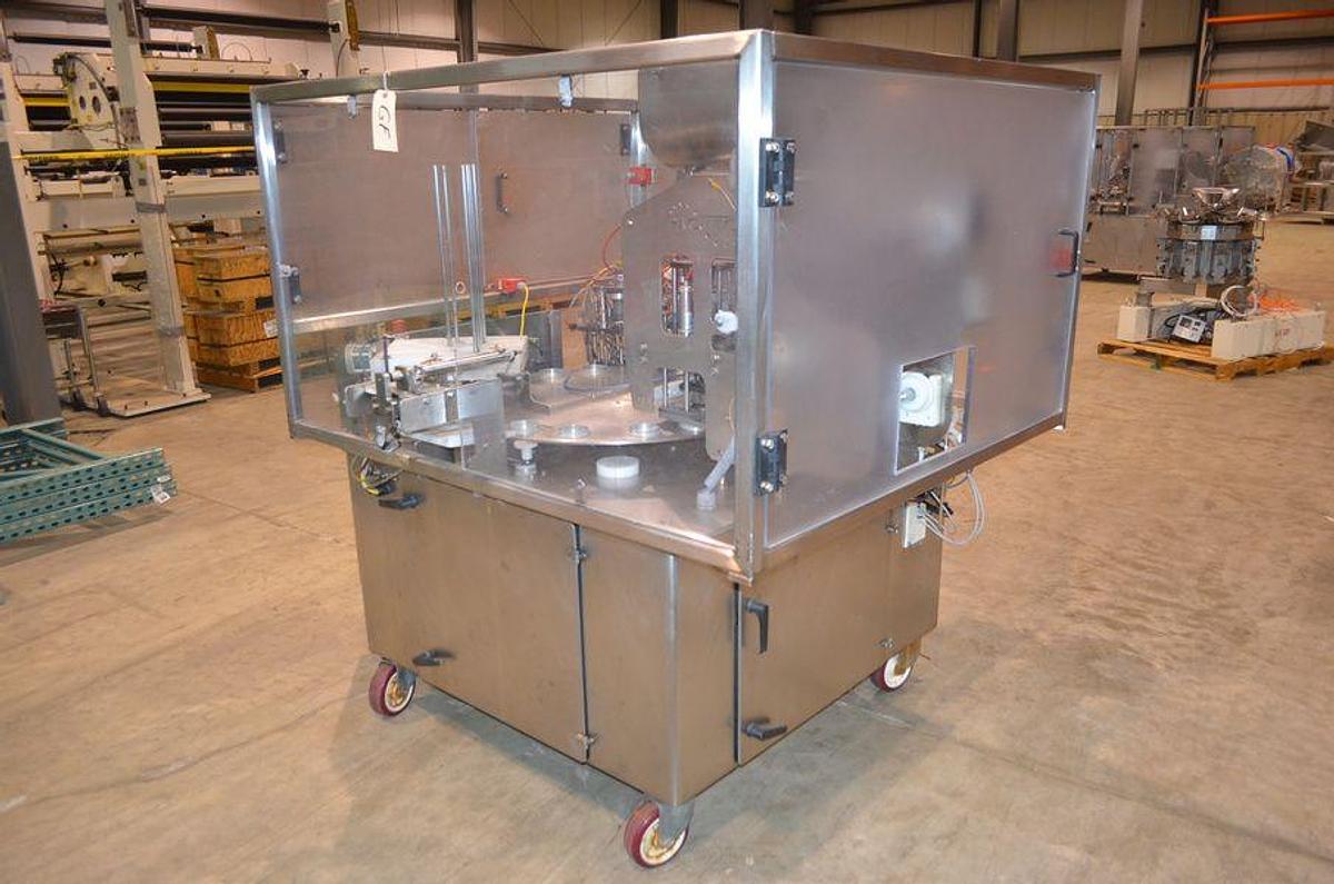 Used PacTec Double Head Rotary Cup Filler with Sealer