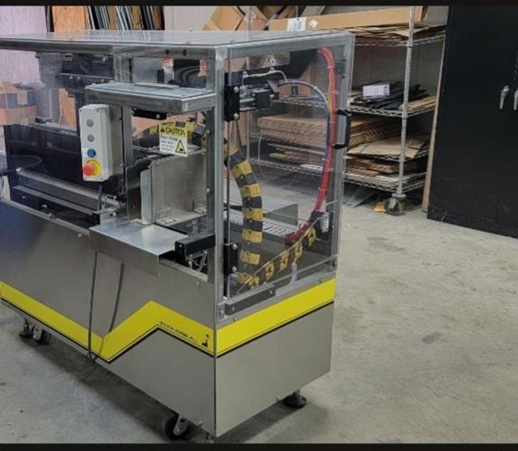 Used USED ECONOSEAL ECONOPACKER