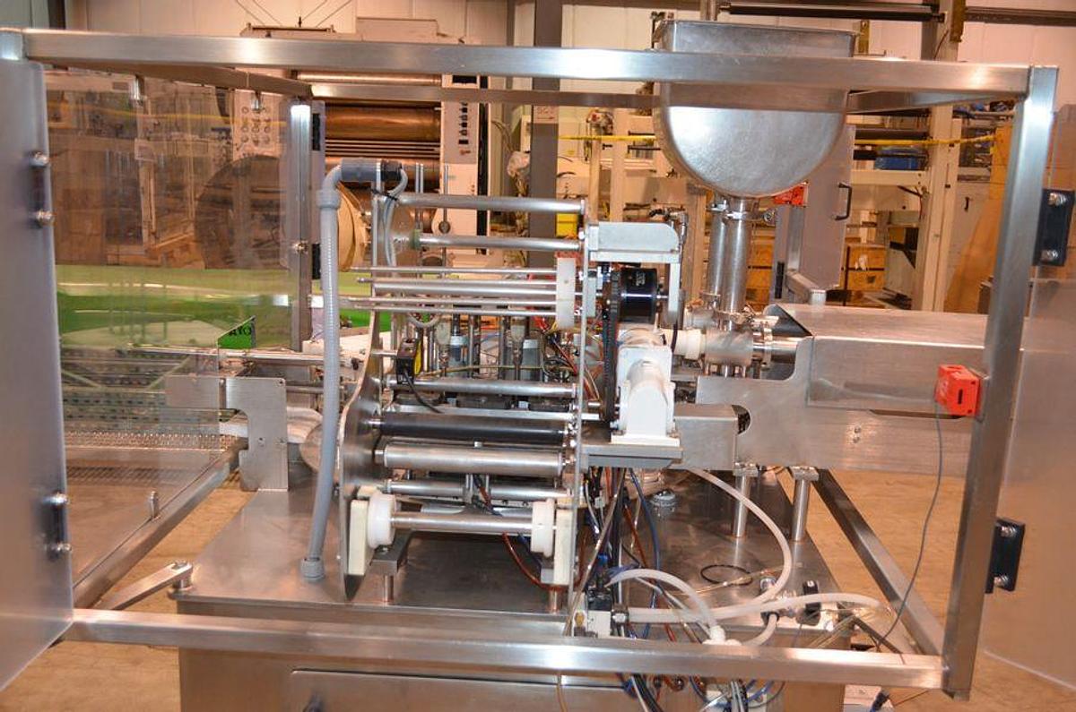 Used PacTec Double Head Rotary Cup Filler with Sealer