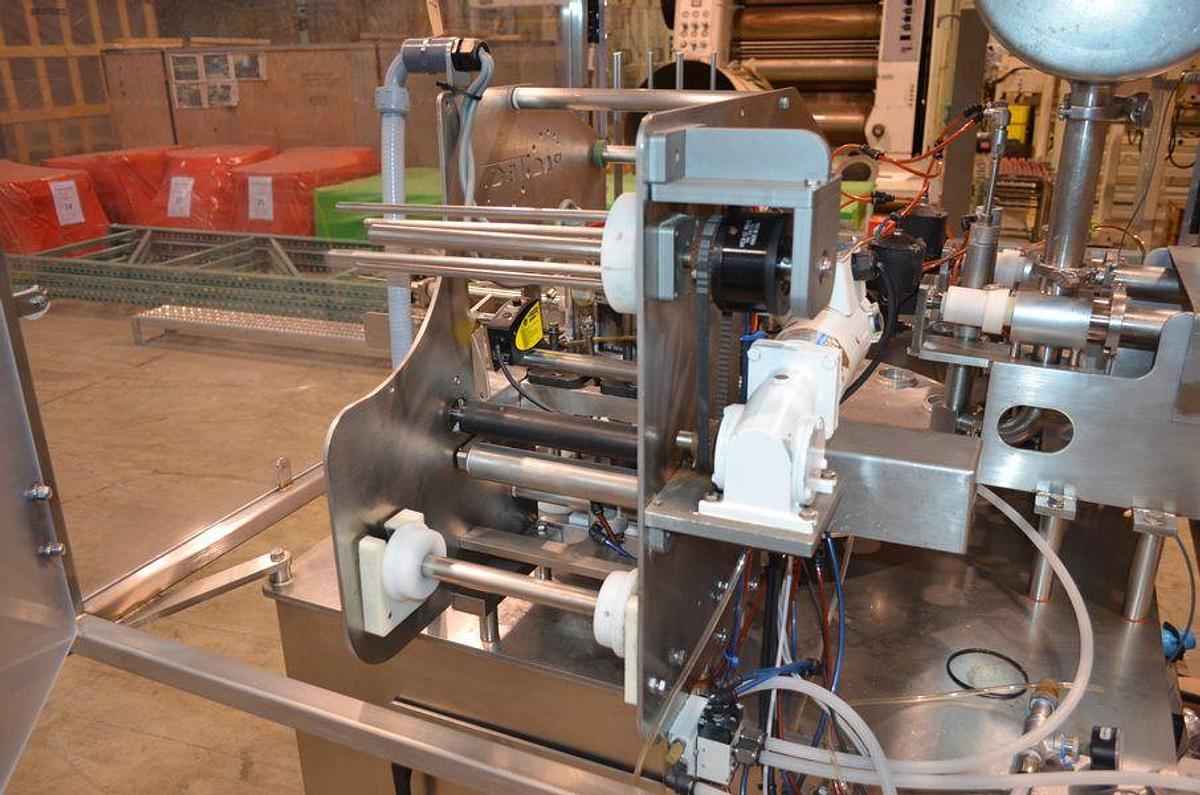 Used PacTec Double Head Rotary Cup Filler with Sealer