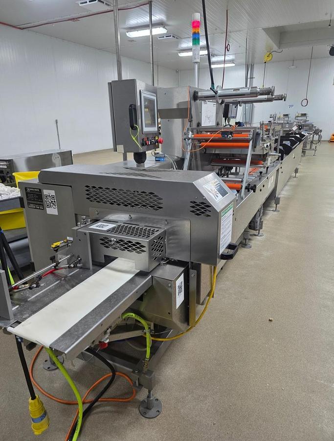 Used Campbell Revolution Flow wrapper with Automation