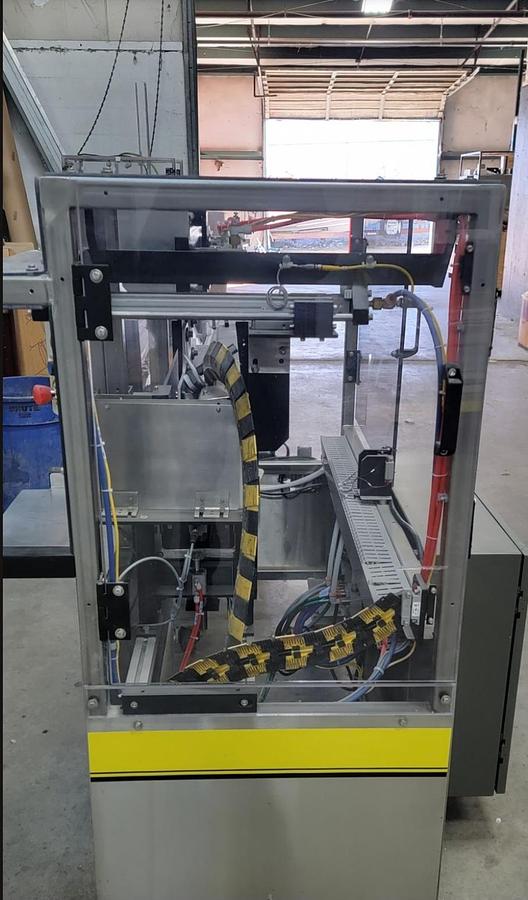 Used USED ECONOSEAL ECONOPACKER