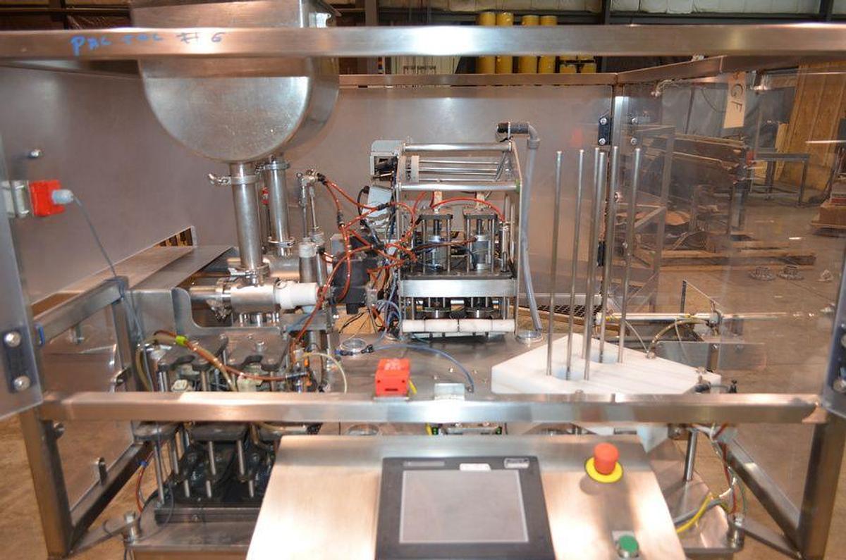 Used PacTec Double Head Rotary Cup Filler with Sealer