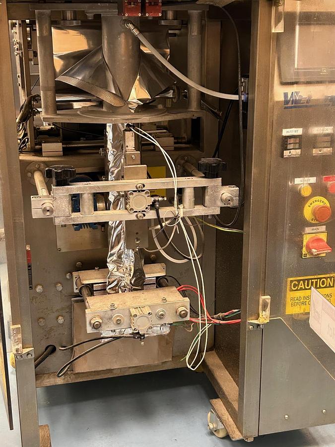 Used Vertek Jr with Weighpack scale 