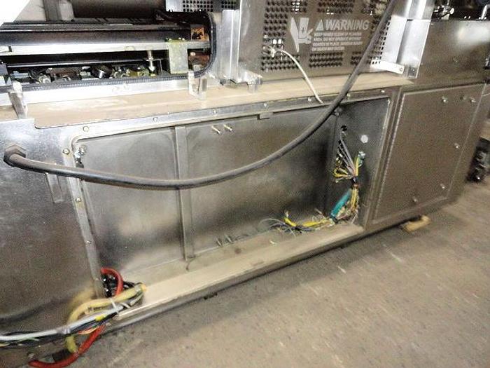 Used TOMAHAWK HIGH SPEED FORMING MACHINE WITH PAPER FEED AND SOFT FEED FILL SYSTEM TM-26