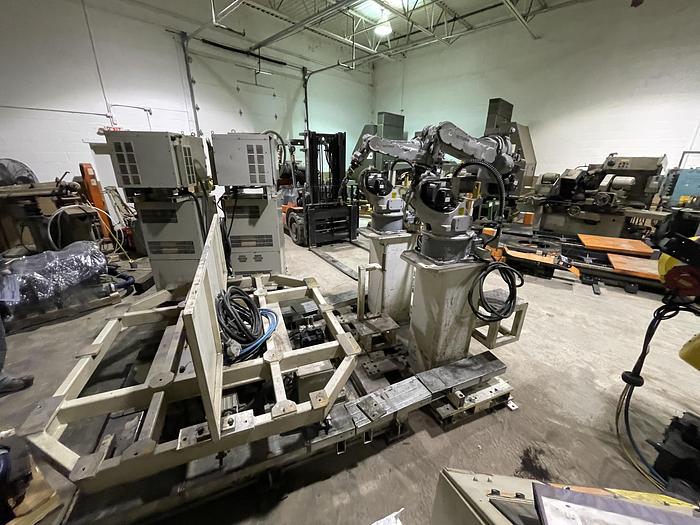 Used MOTOMAN EA1400N DUAL ARM ROBOTIC MIG WELDING CELL WITH 11,000 LB CAPACITY A/B SIDED INDEX TABLE