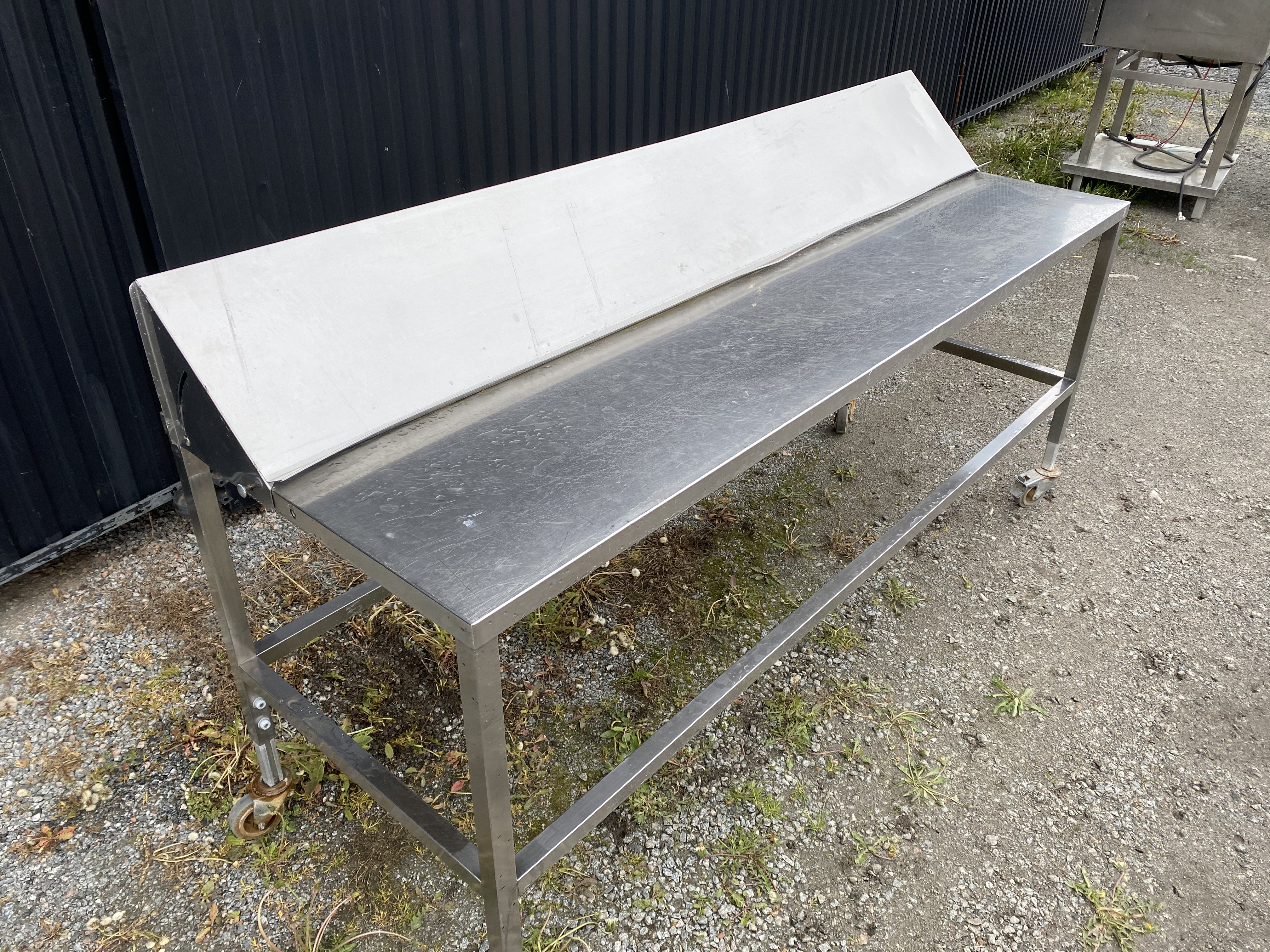 Begagnad Arbetsbord Rostfritt 214x71cm