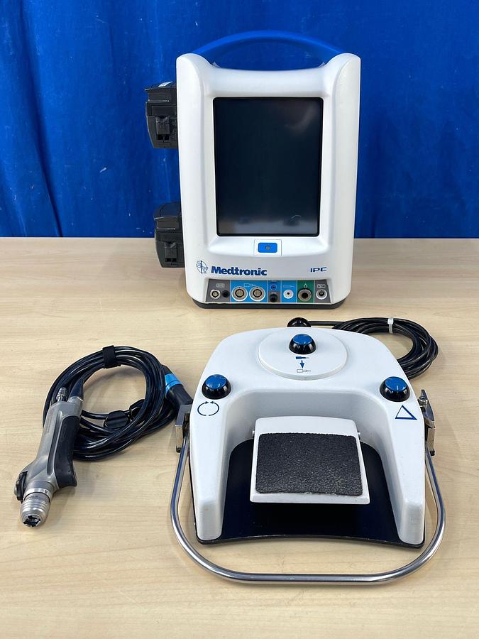 Used MEDTRONIC IPC REF: 1898001 Straight Shot M5 Hand piece REF: 1899200 Footswitch REF: 1898430 IPC