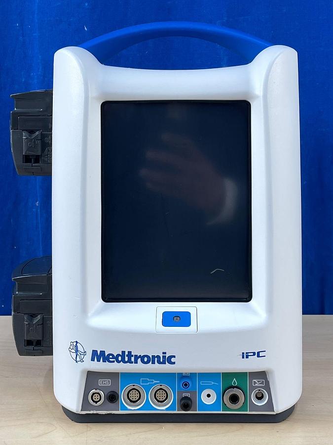 Used MEDTRONIC IPC REF: 1898001 Straight Shot M5 Hand piece REF: 1899200 Footswitch REF: 1898430 IPC