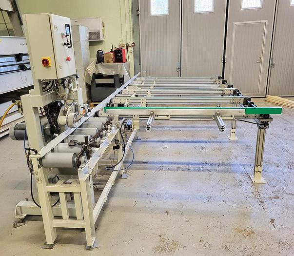 Used PINOMATIC Feeder with full mechanization for planing line.