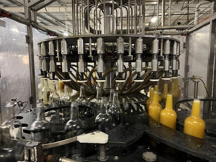 Used Pacific Packaging MonoBloc Liquid Rotary  Filler-Capper