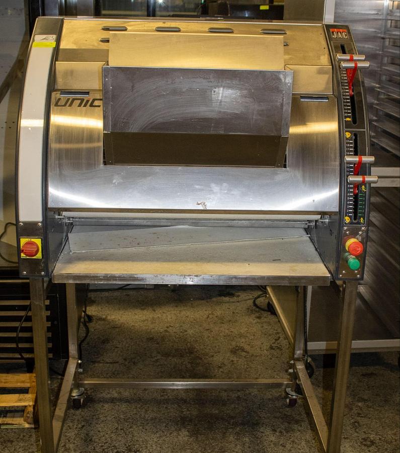 Used JAC UNIC VERTICAL DOUGH MOULDER ON EQUIPMENT STAND
