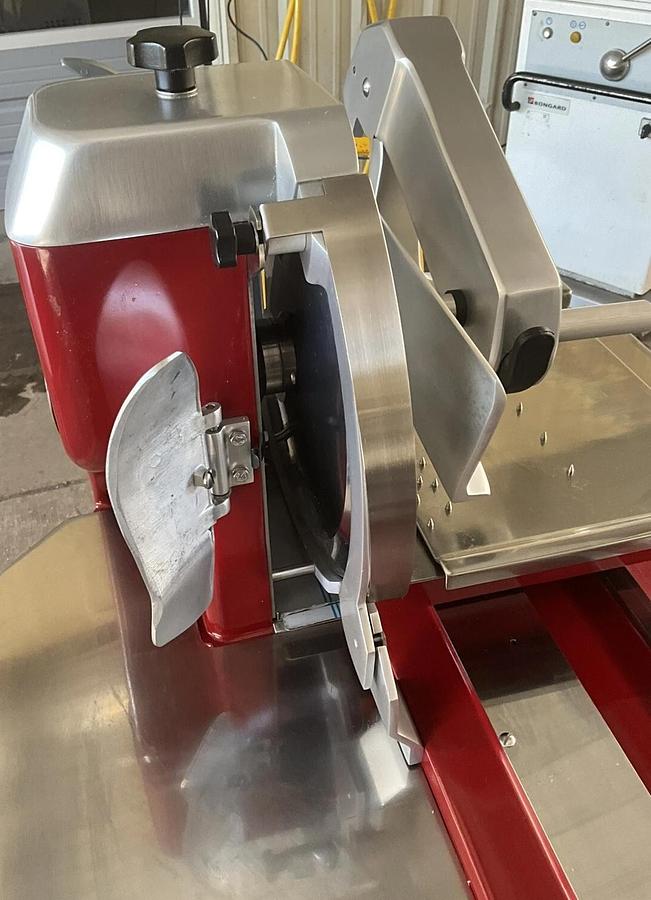 Used 2023 Berkel Prosciutto slicer 330M Hand crank blade sharpener Ham Deli