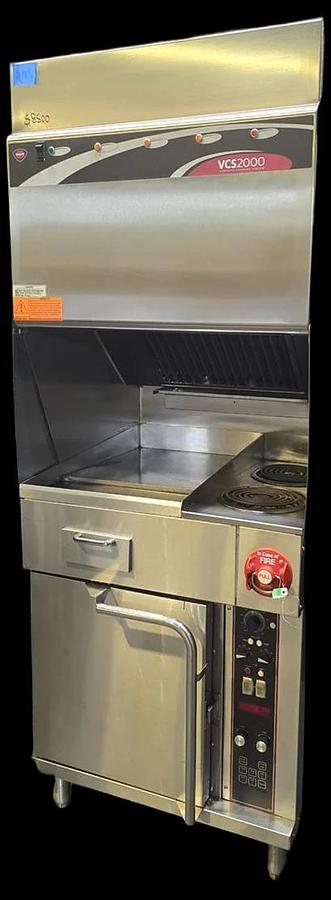 Used Wells Ventless cooking system - 2 burner with flat top grill and oven below