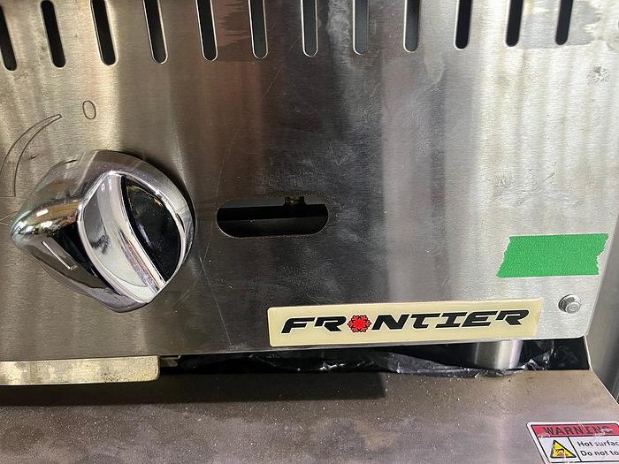 Used Frontier Shrink Wrap Over Counter