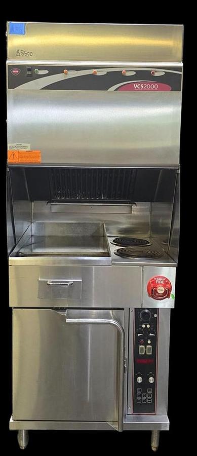 Used Wells Ventless cooking system - 2 burner with flat top grill and oven below