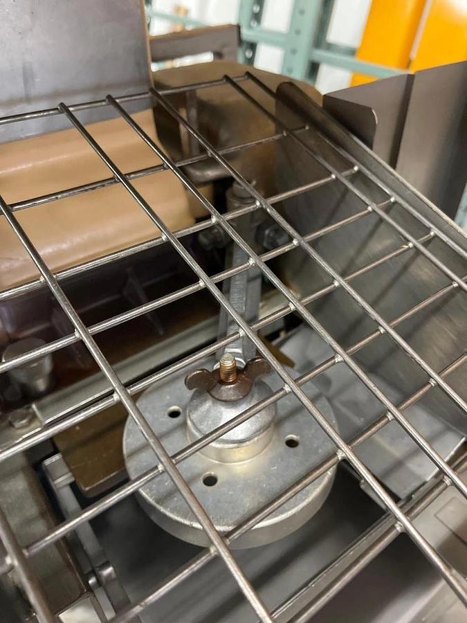 Used Hollymatic Super 54 patty machine with mold plates and accessories