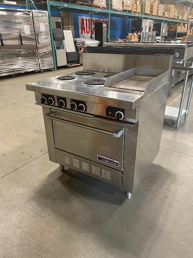 Refurbished Lot 126 GARLAND S686-12R ELECTRIC 4-BURNER RANGE WITH 12" GRIDDLE AND OVEN
