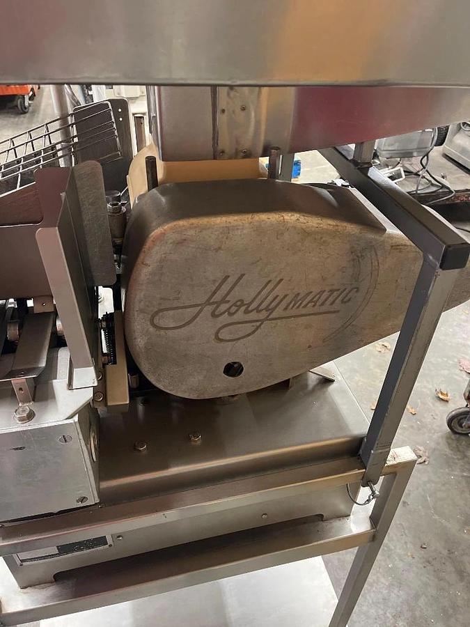 Used Hollymatic Super 54 patty machine with mold plates and accessories
