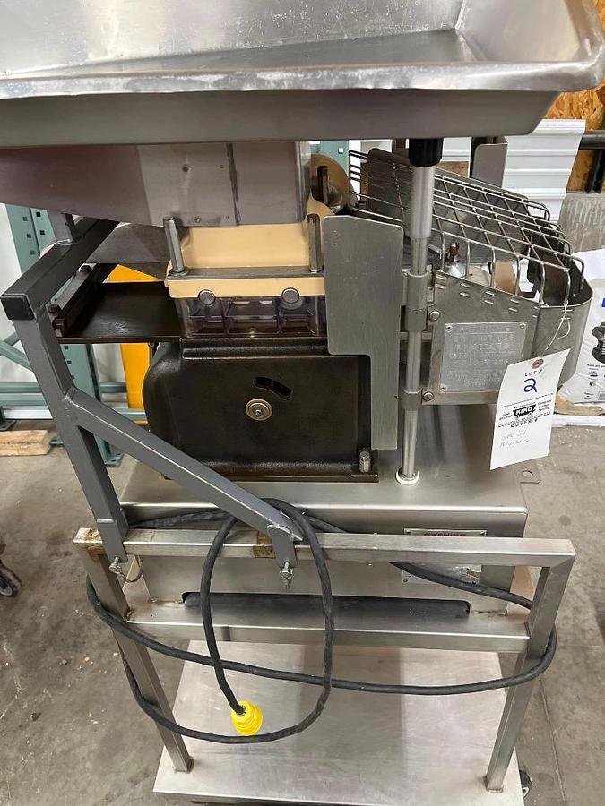Used Hollymatic Super 54 patty machine with mold plates and accessories