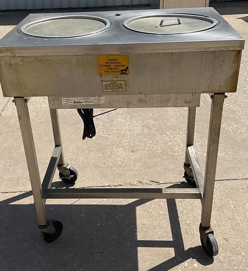 Used Belshaw icing warmer on Casters