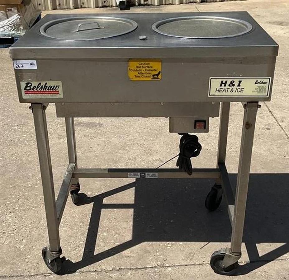 Used Belshaw icing warmer on Casters