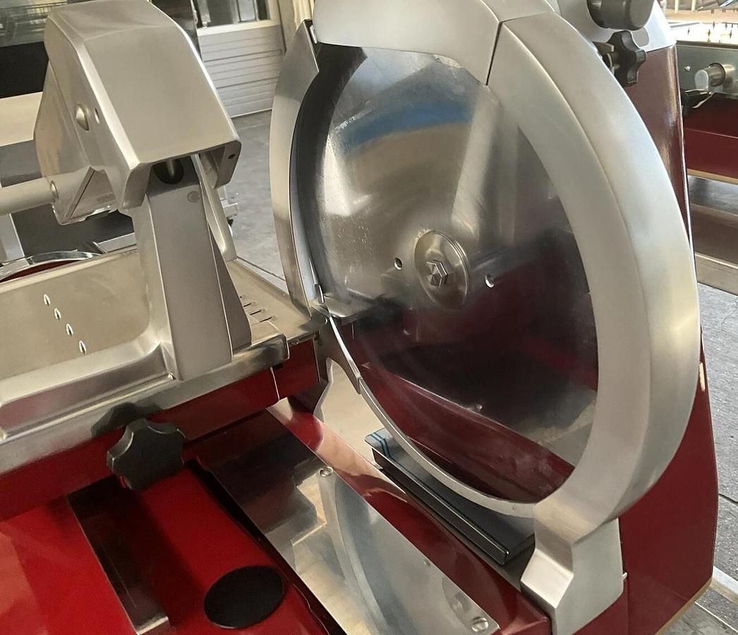 Used 2023 Berkel Prosciutto slicer 330M Hand crank blade sharpener Ham Deli