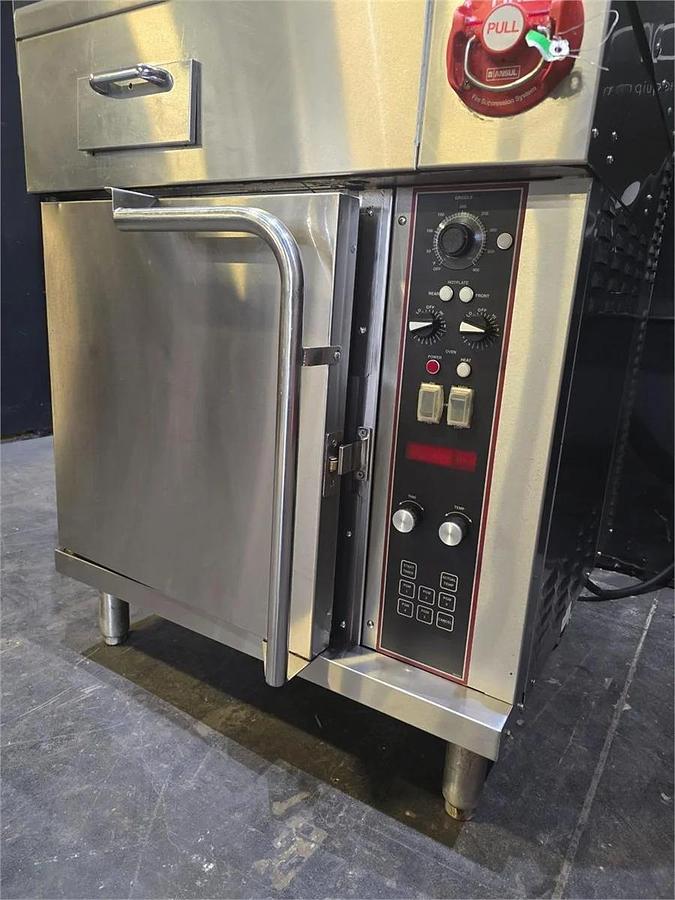 Used Wells Ventless cooking system - 2 burner with flat top grill and oven below