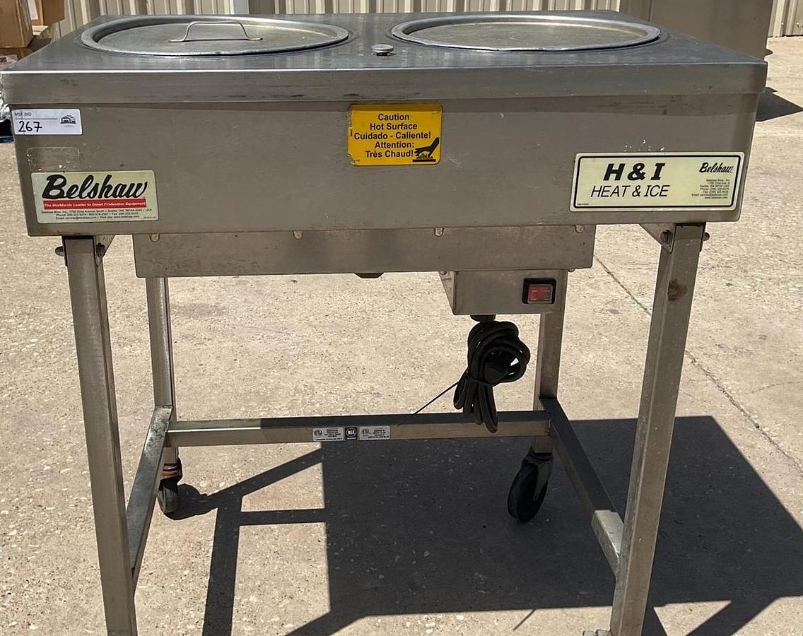 Used Belshaw icing warmer on Casters