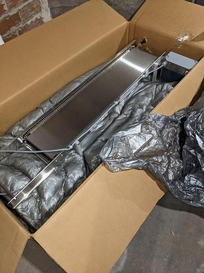 BELSHAW DONUT FEED TABLE - NEW - NEVER USED