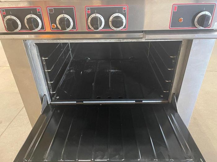 Refurbished Lot 126 GARLAND S686-12R ELECTRIC 4-BURNER RANGE WITH 12" GRIDDLE AND OVEN
