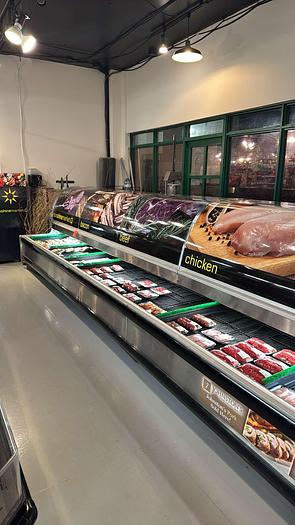 Used 24" meat case with display - glass curved display