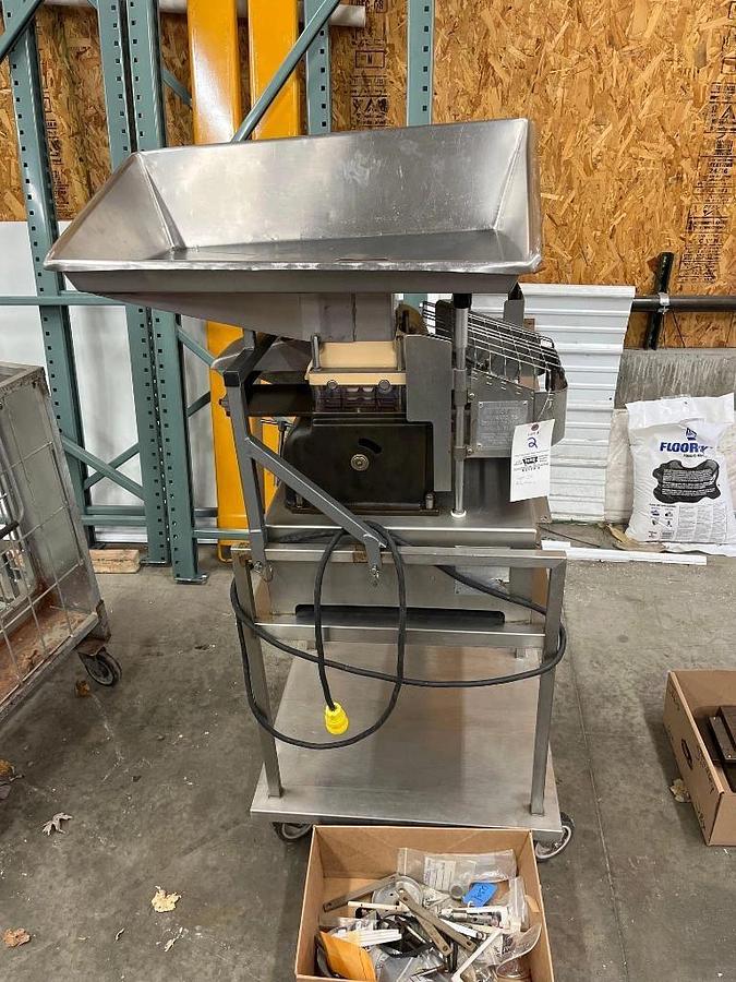 Used Hollymatic Super 54 patty machine with mold plates and accessories