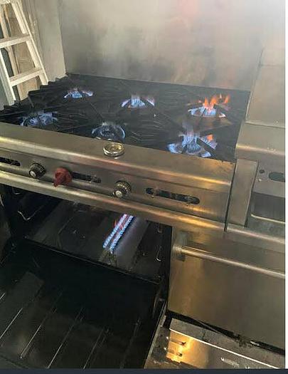Used Wolf combo Gas range - 2 ovens - 6 burners - 24" flat top grill with broiler