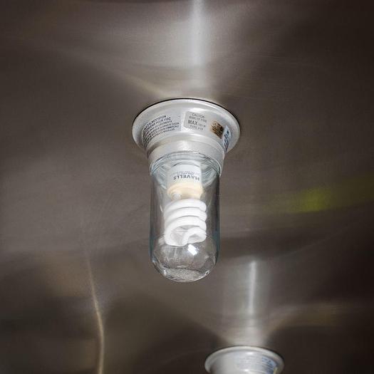 Glass globe for hood light bulb