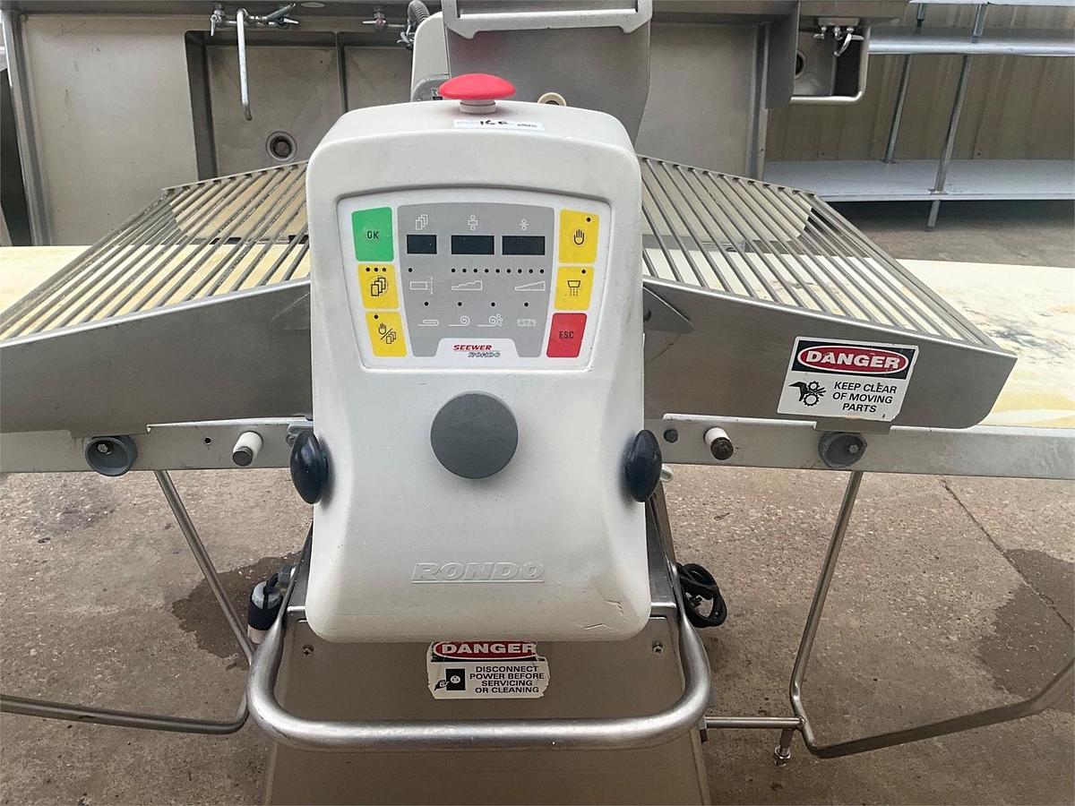 Used Rondo butterfly sheeter with flour duster