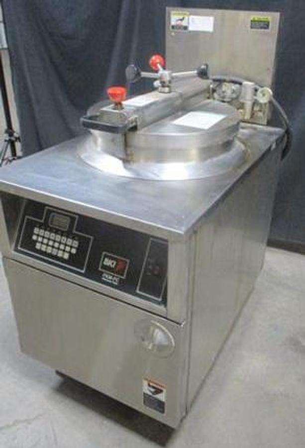 Used BKI 75lb Electric Pressure Fryer With Pull Out Grease Filter.