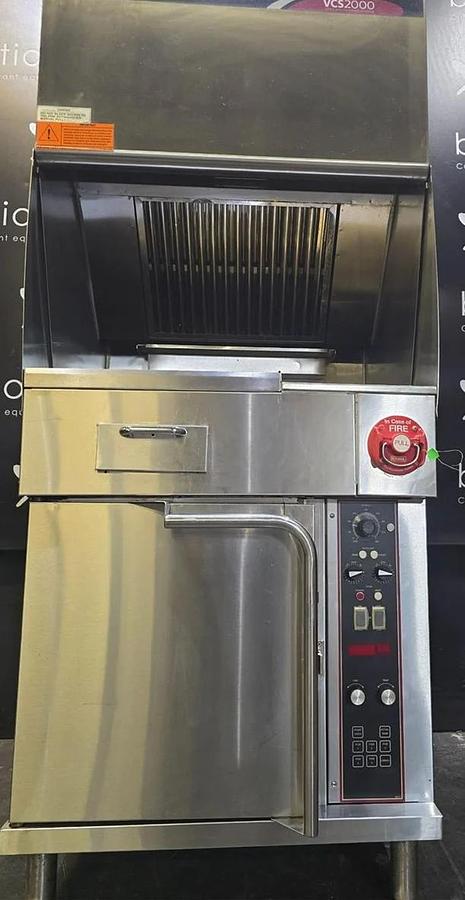 Used Wells Ventless cooking system - 2 burner with flat top grill and oven below
